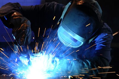 welder with helmet