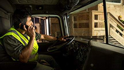 Man on the phone in a vehicle