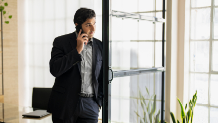 Man talking on the phone in an office