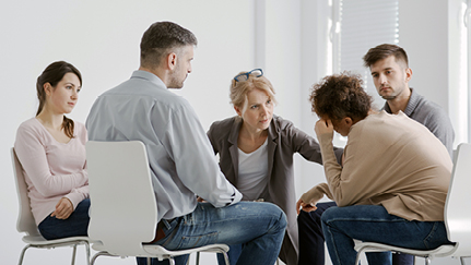 Group of people sitting and talking